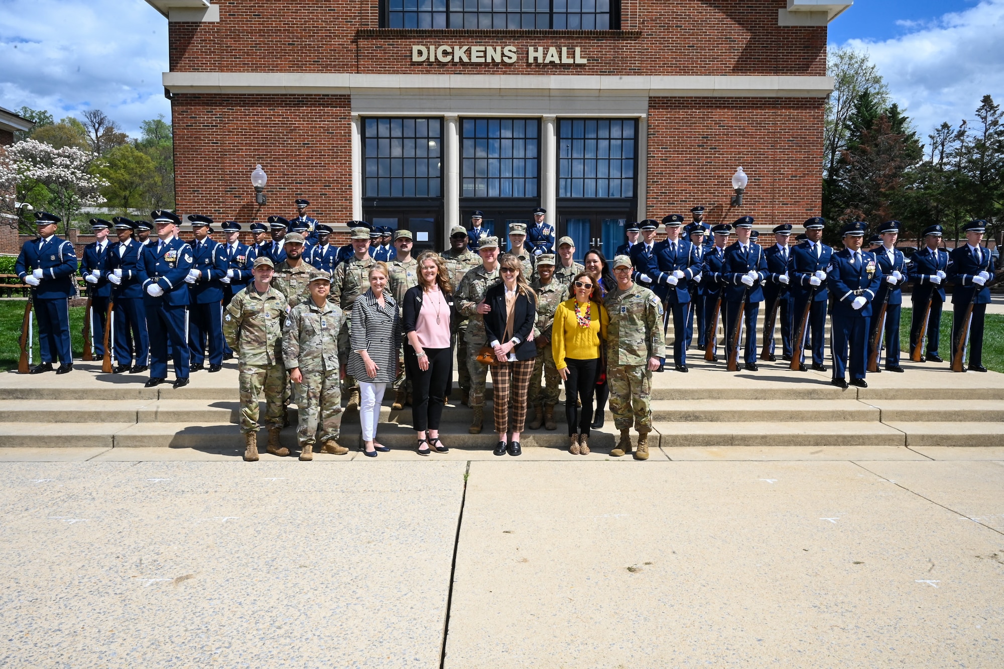 Photo of an United States Air Force Band, and Unites States Space Force and Air Force Honor Guard members pose for a group photo with Space Force leaders.