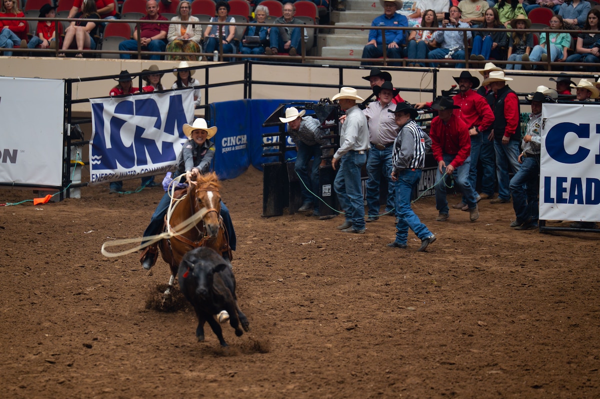 A breakaway roper competes during the San Angelo Stock Show & Rodeo at the Foster Communications Coliseum, San Angelo, Texas, April 16, 2025. Breakaway Roping is a variation of calf roping where a mounted rider attempts to throw a lasso around the neck of a calf. (U.S. Air Force photo by Airman 1st Class Brian Lummus)