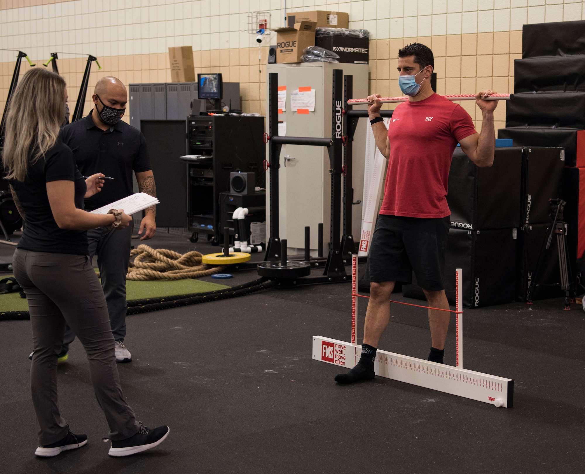 A pilot in the Optimizing the Human Weapons System program, performs a Functional Movement Screening.