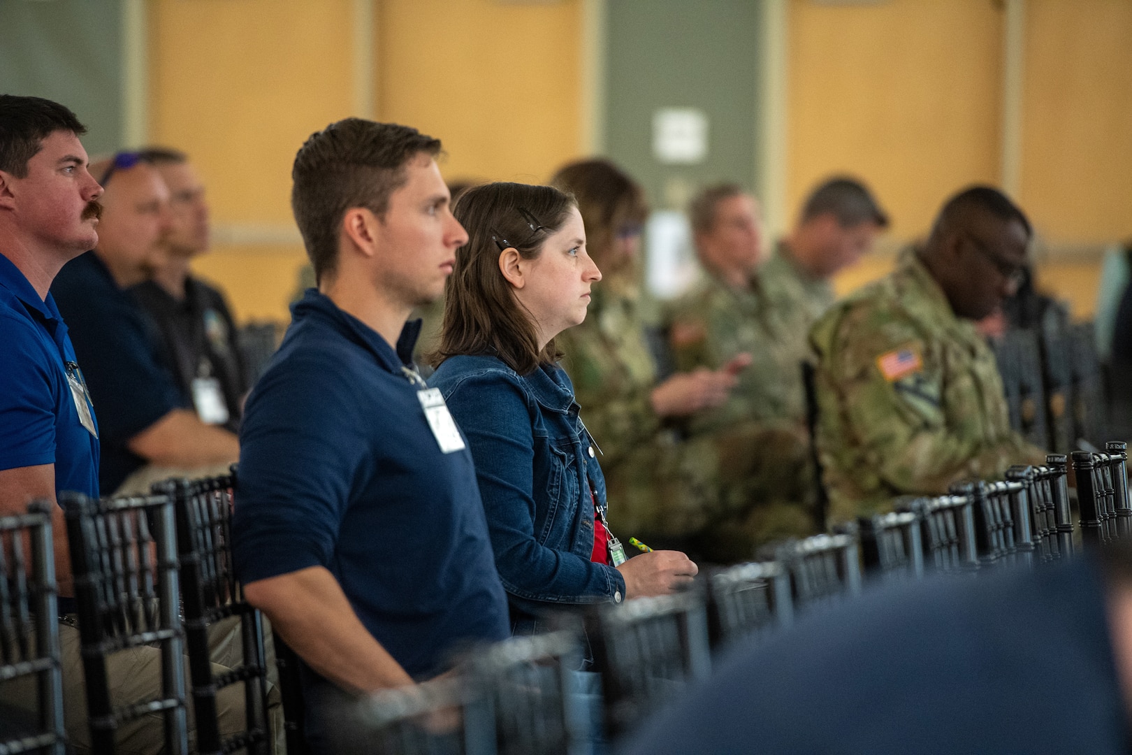 Emergency management professionals and military members listen to a speaker during the 2025 Oklahoma National Guard Domestic Operations Symposium, in Norman, Oklahoma, April 15, 2025. The symposium brings city, county, state, federal and neighboring states together to build partnerships to face future natural and man-made disasters. (Oklahoma National Guard photo by Anthony Jones)