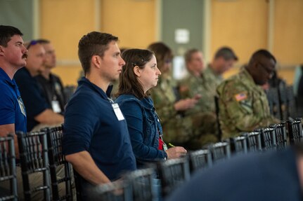Emergency management professionals and military members listen to a speaker during the 2025 Oklahoma National Guard Domestic Operations Symposium, in Norman, Oklahoma, April 15, 2025. The symposium brings city, county, state, federal and neighboring states together to build partnerships to face future natural and man-made disasters. (Oklahoma National Guard photo by Anthony Jones)