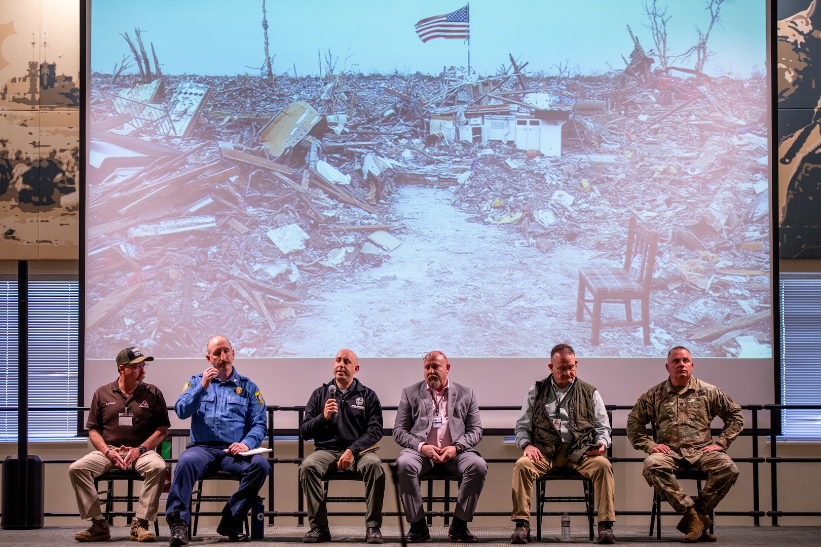 Emergency management professionals and military members answer questions about natural disaster response during the 2025 Oklahoma National Guard Domestic Operations Symposium, in Norman, Oklahoma, April 15, 2025. The symposium brings city, county, state, federal and neighboring states together to build partnerships to face future natural and man-made disasters. (Oklahoma National Guard photo by Anthony Jones)