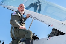 Michael Patterson, Hometown Hero participant, poses for a picture before his flight with the Thunderbirds on April 4, 2025 at Nellis Air Force Base, Nevada.