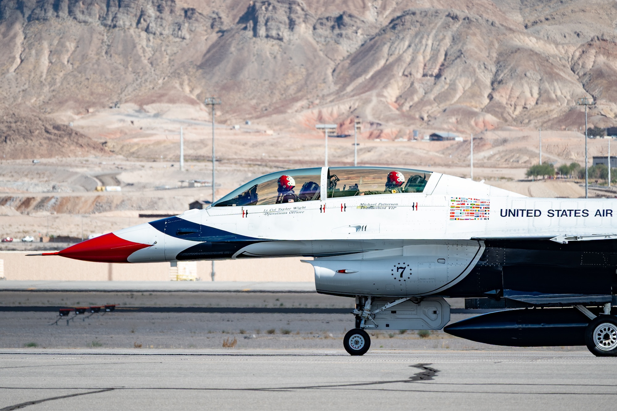 U.S. Air Force Lt. Col. Taylor Wight, an operations officer assigned to the Thunderbirds, and Michael Patterson, a Hometown Hero participant, prepare for take-off on April 4, 2025, at Nellis Air Force Base, Nevada.