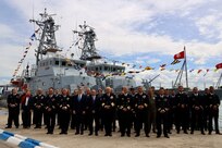 Sailors, officials, dignitaries and guests pose for a group photo following the commissioning of two Tunisian Navy Island Class Patrol Boats transferred from the United States in Tunis, Tunisia, April 17, 2025.