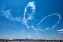 The Undaunted team perform an aerial display with a two ship formation with a Van’s RV-7 and a Van’s RV-8 aircraft during Aviation Nation 2025 at Nellis Air Force Base, Nevada, April 4, 2025.