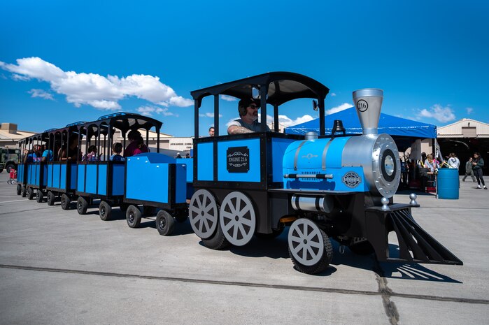 A train for children rides on the flightline during Aviation Nation 2025 at Nellis Air Force Base, Nevada, April 4, 2025.