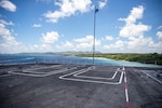 The aircraft carrier USS Nimitz (CVN 68) pulls into Naval Base Guam for a scheduled port visit, April 18, 2025.