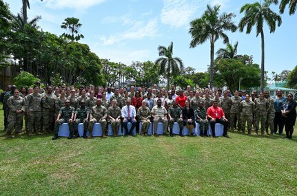 President of Guyana Mohamed Irfaan Ali, U.S. Air Force Maj. Gen. Melissa A. Coburn, 22nd Air Force commander, U.S. Air Force Lesser Antilles Medical Assistance Team members, and other Guyanese government officials pose for a group photo following the closing ceremony for the LAMAT mission at the Guyana President’s estate in Georgetown, Guyana, April 11, 2025.