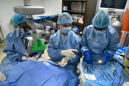 U.S. Air Force Maj. Samuel Hobbs, 59th Medical Wing vitreoretinal surgeon, works with local healthcare professionals during ophthalmology surgery at the Georgetown Public Hospital, Georgetown, Guyana, April 7, 2025 during the Lesser Antilles Medical Assistance Team 2025 mission.