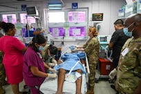 U.S. Air Force members from the 433rd Aeromedical Staging Squadron work with Guyanese healthcare professionals during an emergency at the Georgetown Public Hospital during the Lesser Antilles Medical Assistance Team mission in Georgetown, Guyana, April 3, 2025.