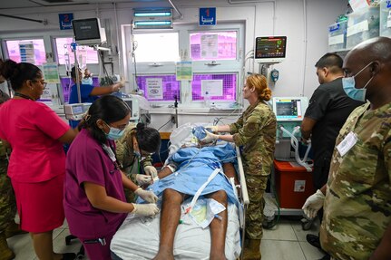 U.S. Air Force members from the 433rd Aeromedical Staging Squadron work with Guyanese healthcare professionals during an emergency at the Georgetown Public Hospital during the Lesser Antilles Medical Assistance Team mission in Georgetown, Guyana, April 3, 2025.