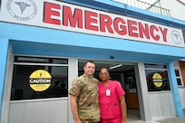 U.S. Air Force Tech. Sgt. Rodrigo Salinas, 433rd Aeromedical Staging Squadron medical technician, and Gangapattie Dani, Georgetown Public Hospital Accident and Emergency Department ward manager, pose for a photos outside the emergency room at the Georgetown Public Hospital during the Lesser Antilles Medical Assistance Team mission in Georgetown, Guyana, April 7, 2025.