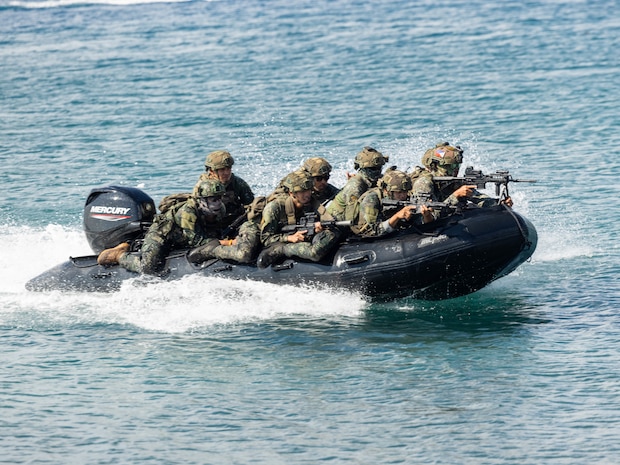 Philippine Reconnaissance Marines with 1st Marine Brigade, ride on a combat rubber raiding craft during an amphibious assault demonstration rehearsal as part of Marine Exercise 2025 near Cotabato City, Mindanao, Philippines, April 8, 2025.