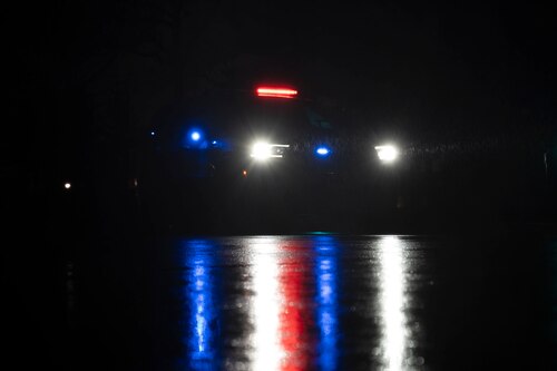 An 87th Security Forces Squadron police car responds to a drone sighting during Operation Honey Badger (OHB) at Joint Base McGuire-Dix-Lakehurst, N.J., April 7, 2025. OHB is an exercise organized by the 87th Civil Engineer Squadron to prepare Airmen for real-world situations and promote mission readiness. (U.S. Air Force photo by Airman 1st Class Luisa E. Dugan)