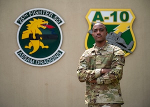 U.S. Air Force Senior Airman Christopher Djedi, 25th Fighter Squadron commander’s support staff, poses for a photo at Osan Air Base, Republic of Korea, April 16, 2025. Djedi was recognized as Mustang of the Week for his professional commitment in the workplace. (U.S. Air Force photo by Senior Airman Sarah Williams)