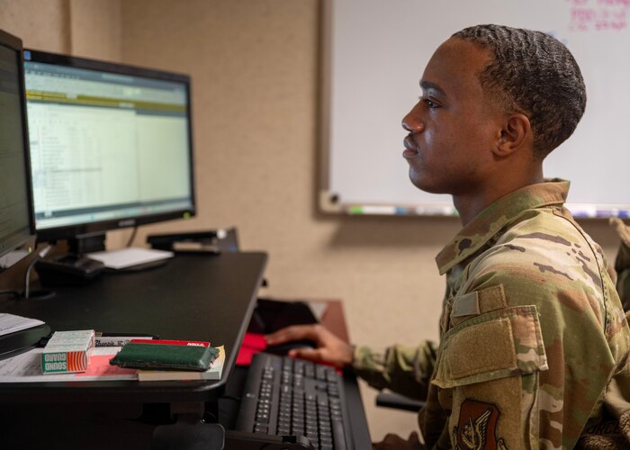 U.S. Air Force Senior Airman Christopher Djedi, 25th Fighter Squadron commander’s support staff, adjusts a projected departure date at Osan Air Base, Republic of Korea, April 16, 2025. Djedi is responsible for assisting the commander and unit personnel by managing essential administrative processes. (U.S. Air Force photo by Senior Airman Sarah Williams)