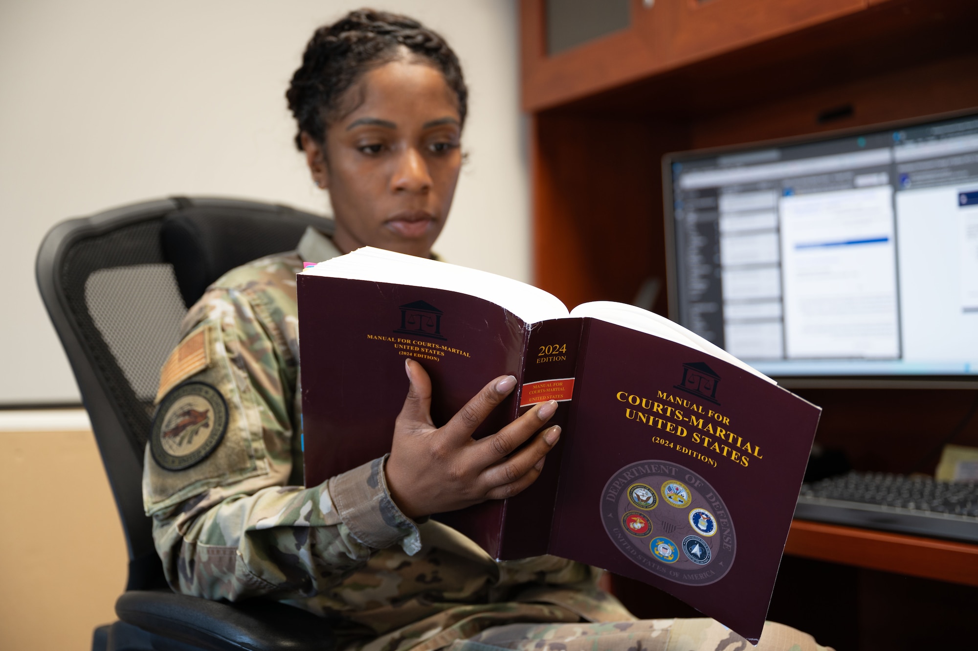U.S. Air Force Capt. Díandra Romero, 39th Air Base Wing Area Defense Counsel, reads the Manual for Courts-Martial U.S. at Incirlik Air Base, Türkiye, April 7, 2025.The ADC’s purpose is to advocate for Airmen when they have alleged non-judicial punishment actions or misconduct charges against them by the Air Force.
