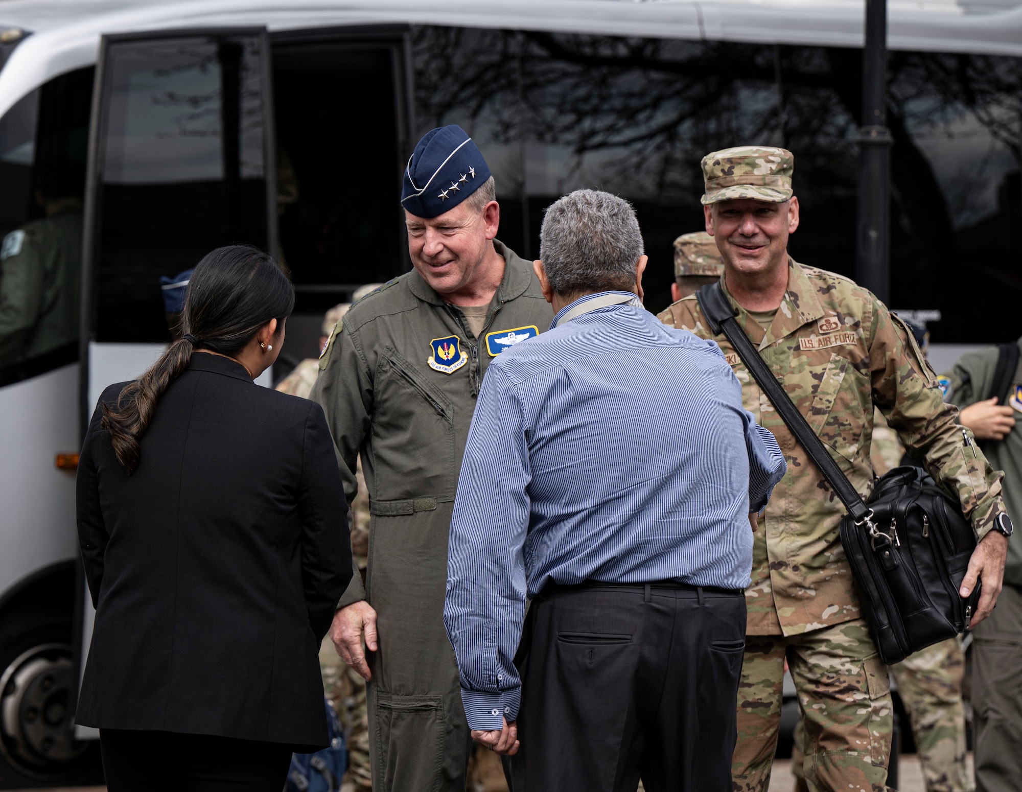 U.S. Air Force Gen. James Hecker, left, U.S. Air Forces in Europe - Air Forces Africa commander, greets the Gateway Inn staff after arriving for the Wing Leadership Conference 2025 at RAF Mildenhall, England, April 14, 2025.
