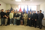 Group photo of DLA Distribution Korea employees.