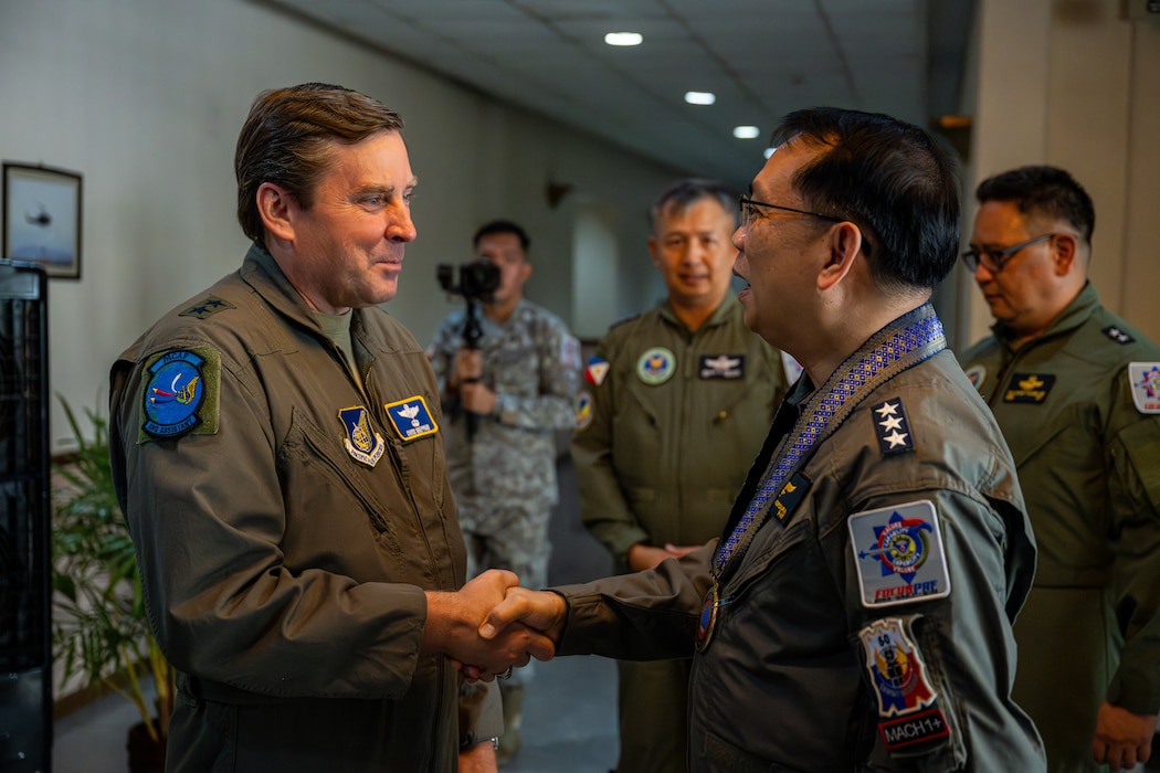 Two officers shaking hands
