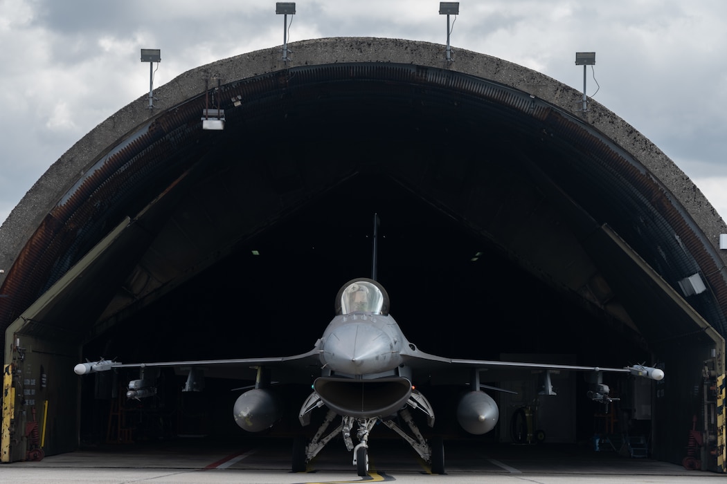 An F-16 in a shelter.