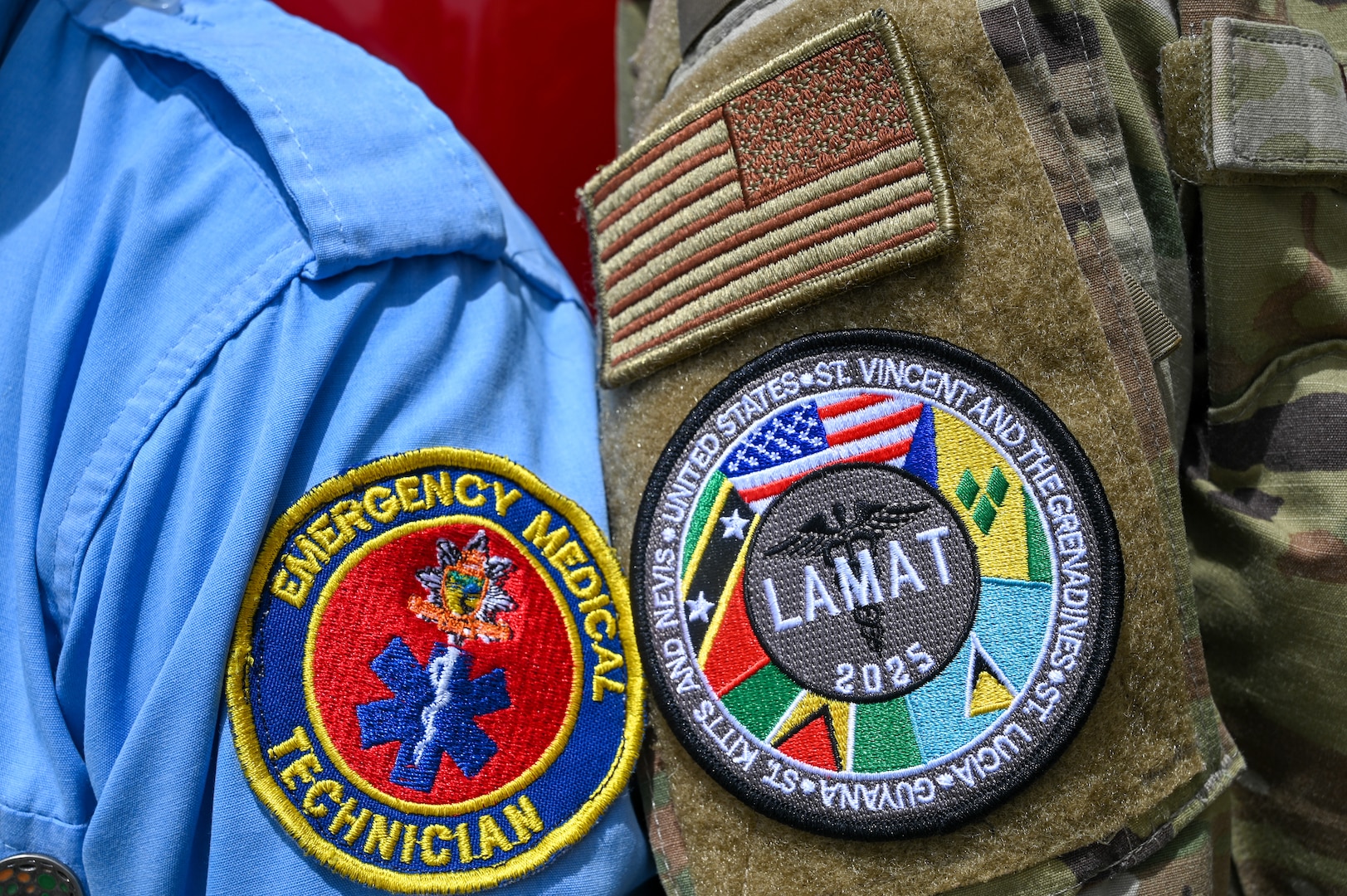 U.S. Air Force Senior Airman Brandon Lowe, 433rd Aeromedical Staging Squadron medical technician, and Cleveland King, a Guyana Fire and Emergency Medical Service advanced emergency medical technician training officer, pose for a picture at the Guyana Fire Service Headquarters after EMT training during the Lesser Antilles Medical Assistance Team mission in Georgetown, Guyana, April 3, 2025.