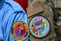 U.S. Air Force Senior Airman Brandon Lowe, 433rd Aeromedical Staging Squadron medical technician, and Cleveland King, a Guyana Fire and Emergency Medical Service advanced emergency medical technician training officer, pose for a picture at the Guyana Fire Service Headquarters after EMT training during the Lesser Antilles Medical Assistance Team mission in Georgetown, Guyana, April 3, 2025.