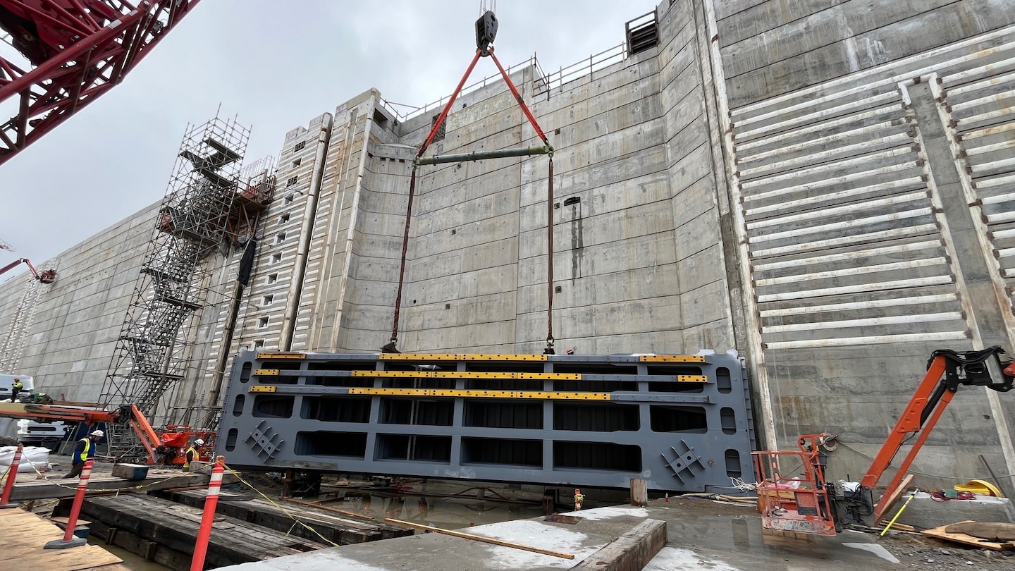 The first miter gate piece is assembled April 7, 2025, on the downstream side of Chickamauga Lock on the Tennessee River in Chattanooga, Tennessee. (USACE Photo by Cayce Grall)
