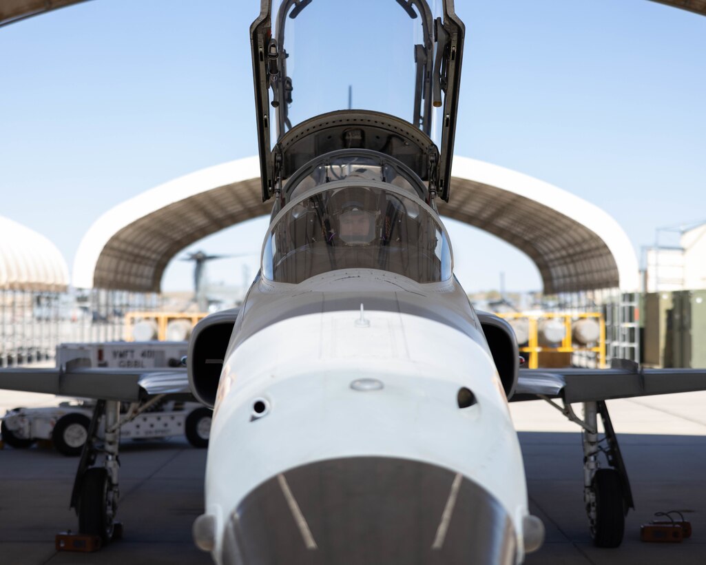 U.S. Marine Corps Lt. Col. Eric Scherrer, commanding officer, Marine Fighter Training Squadron 401 (VMFT-401), Marine Aircraft Group 41, 4th Marine Aircraft Wing, conducts preflight checks in an F-5N Tiger II at Marine Corps Air Station Yuma, Arizona, Oct. 28, 2022. VMFT-401 is the only adversary squadron with the mission to act as the opposing force in simulated air combat. (U.S. Marine Corps photo by Lance Cpl. Jade Venegas)
