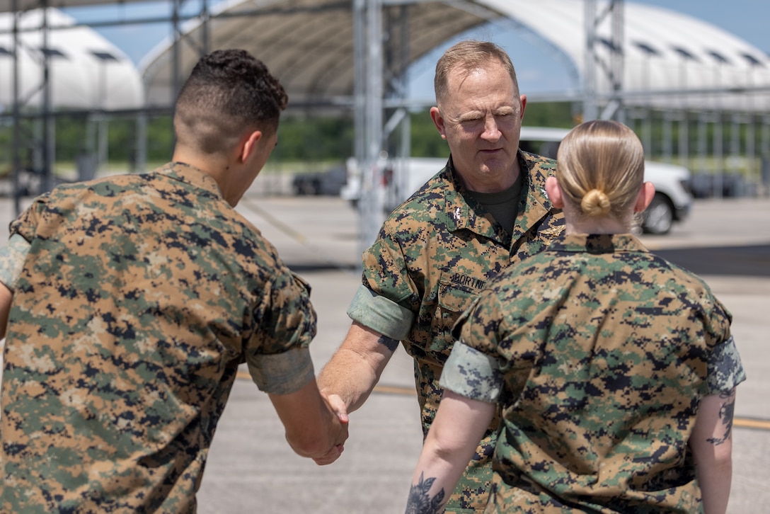 U.S. Marine Corps Col. Mark Bortnem speaks with Marines from Marine Fighter Training Squadron (VMFT) 402, Marine Aircraft Group 41, 4th Marine Aircraft Wing, at Marine Corps Air Station Beaufort, South Carolina, May 30, 2024. VMFT-402 will be the Marine Corps’ second adversary squadron and will officially be redesignated in Sept. (U.S. Marine Corps photo by Lance Cpl. Kyle Baskin)
