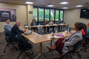 AFAS CEO talks to Military Family and Readiness center staff about changes to several programs.