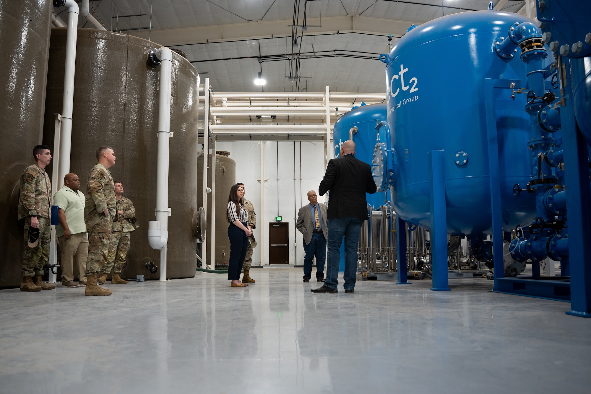 Rachel Montoya, policy advisor to congresswoman Teresa Leger Fernandez, and Ben Salazar, local field representative to congresswoman Teresa Leger Fernandez, tour the perfluoroalkyl and polyfluoroalkyl substances pump and treatment facility at Cannon Air Force Base, New Mexico.
