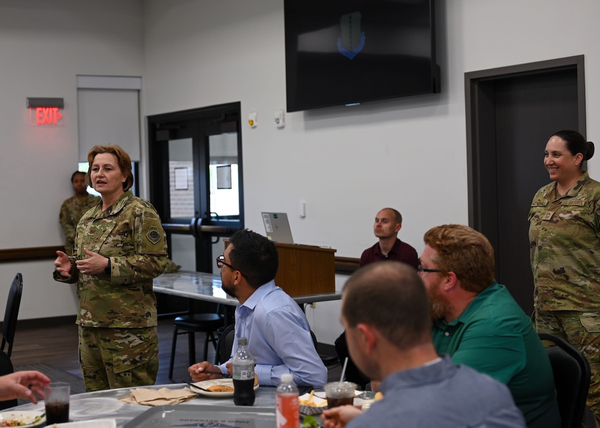 U.S. Air Force Col. Angelina Maguinness, 17th Training Wing commander, and Chief Master Sgt. Stephanie Zengerle, 315th Training Squadron senior enlisted leader, brief the 2025 class of Leadership San Angelo during the Leadership San Angelo Immersion at the Cressman Dining Facility, Goodfellow Air Force Base, Texas, April 17, 2025. During the nine-month program, the group will attend presentations, tour facilities, and interact with representatives from local businesses, non-profit organizations, educational institutions, and public offices. (U.S. Air Force photo by Senior Airman Evelyn J. D’Errico)