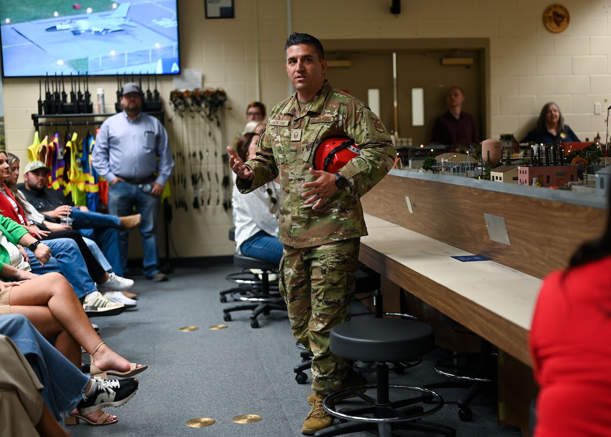 U.S. Air Force Master Sgt. Andrew Montano, 312th Training Squadron fire instructor and flight chief, describes the Norma Brown simulator during the Leadership San Angelo Immersion at the Louis F. Garland Department of Defense Fire Academy, Goodfellow Air Force Base, Texas, April 17, 2025. The Norma Brown simulator is one of the Louis F. Garland Department of Defense Fire Academy’s oldest training tools; originally designed in 1974, it is a miniature military installation with over 10,000 customizable crisis scenarios in the fire officers’ incident management course. (U.S. Air Force photo by Senior Airman Evelyn J. D’Errico)
