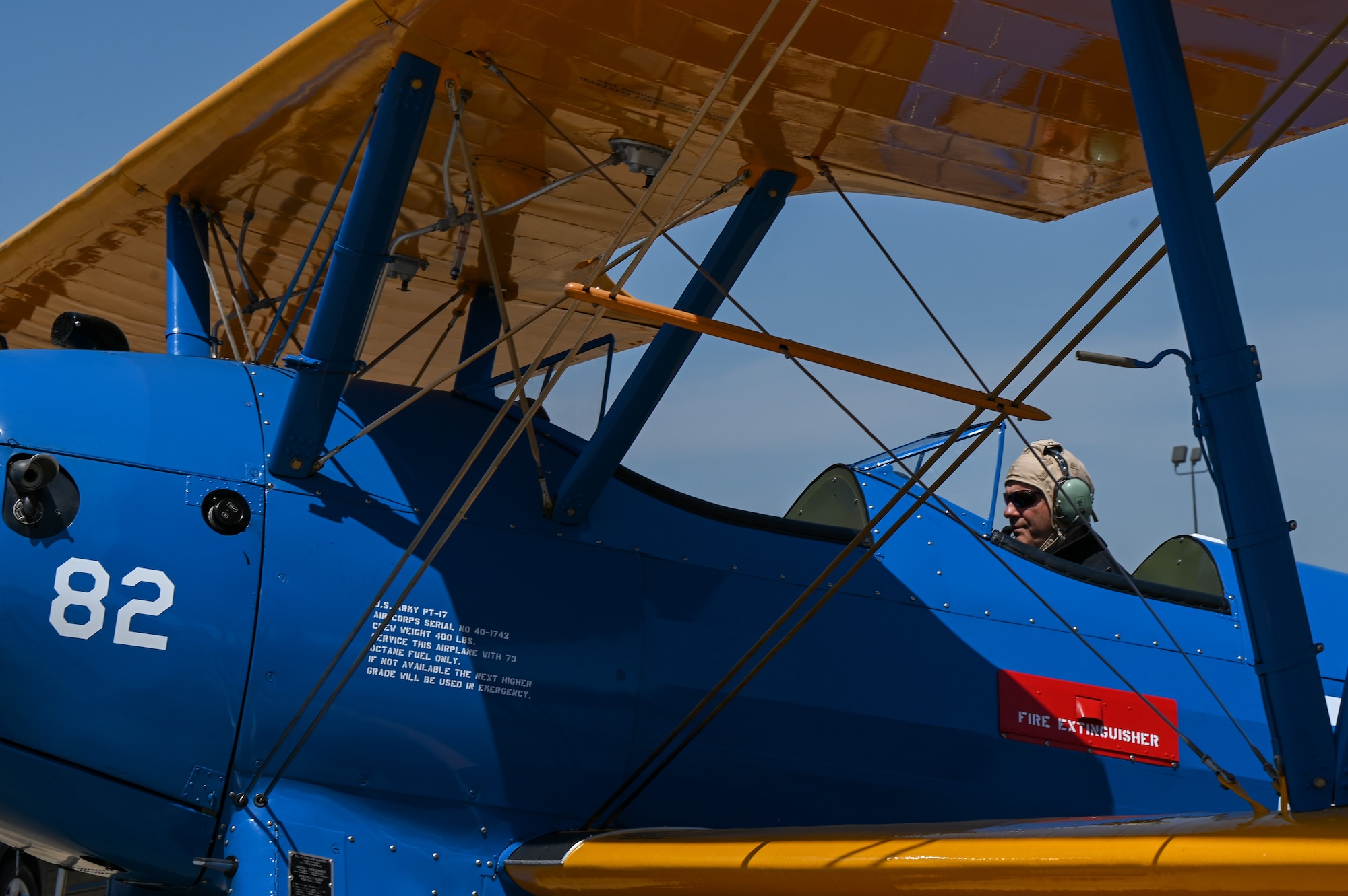 Butch Cole, Commemorative Air Force PT-17 Stearman pilot, parks the aircraft on the flight line at Maxwell Air Force Base, Alabama, April 17, 2025.