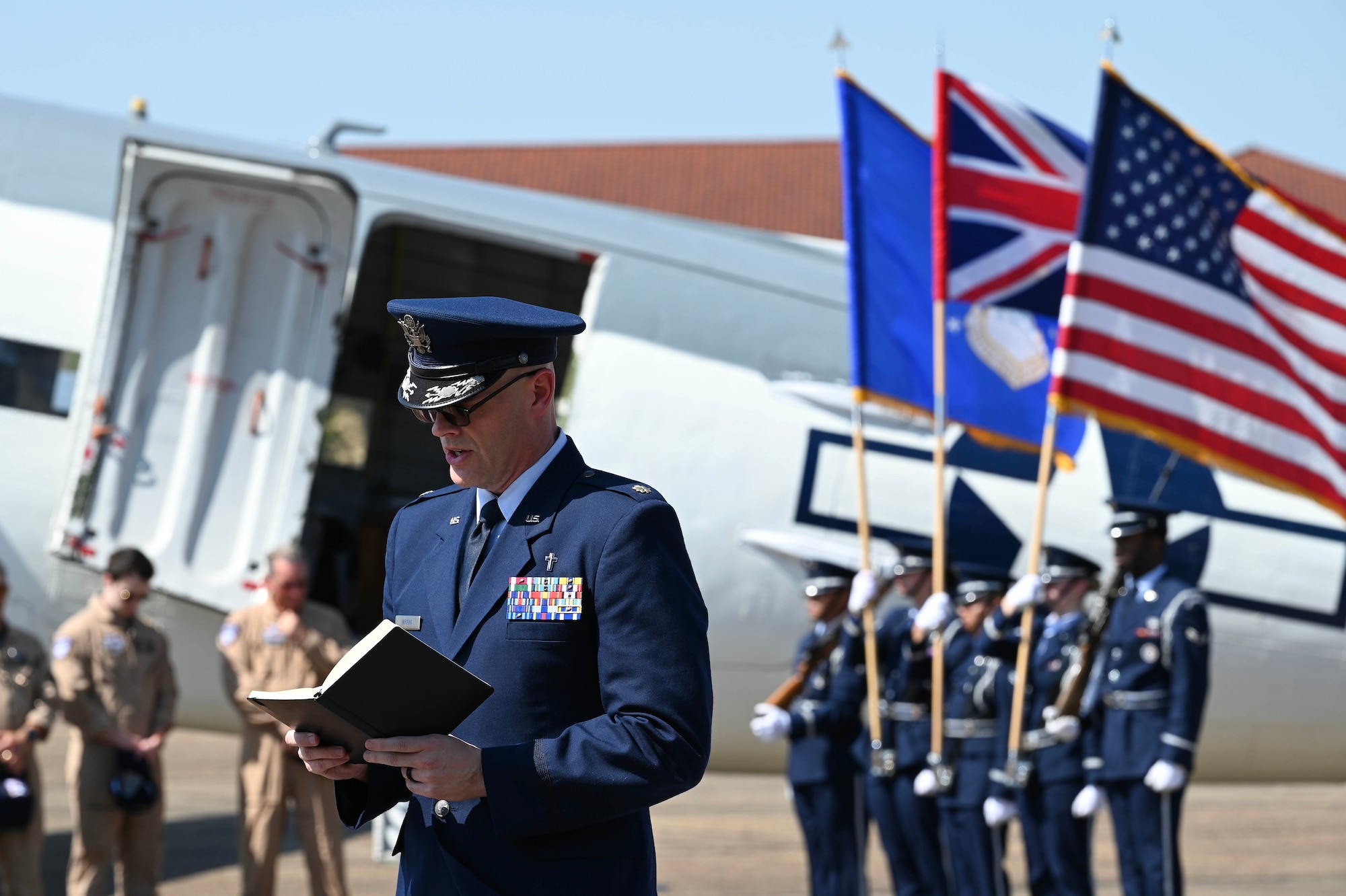 U.S. Air Force Maj. Joeseph Wright, a chaplain currently attending the Air Command and Staff College, reads an invocation during a ceremony at Maxwell Air Force Base, Alabama, April 17, 2025.