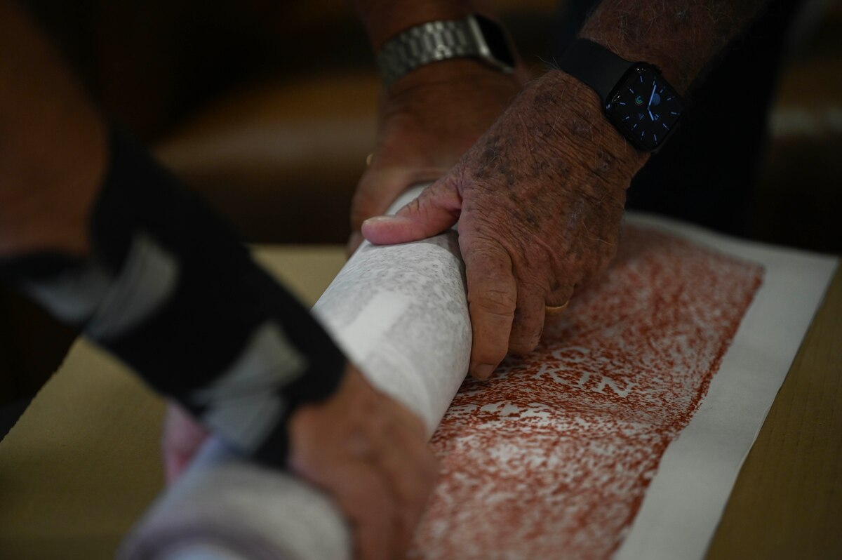 Todd Anderson and Brent Blackwell, Commemorative Air Force Birmingham Escadrille Wing unit members, package gravestone rubbings of 78 Royal Air Force Airmen buried at the Oakwood Cemetery Annex in Montgomery at Maxwell Air Force Base, Alabama, April 17, 2025.