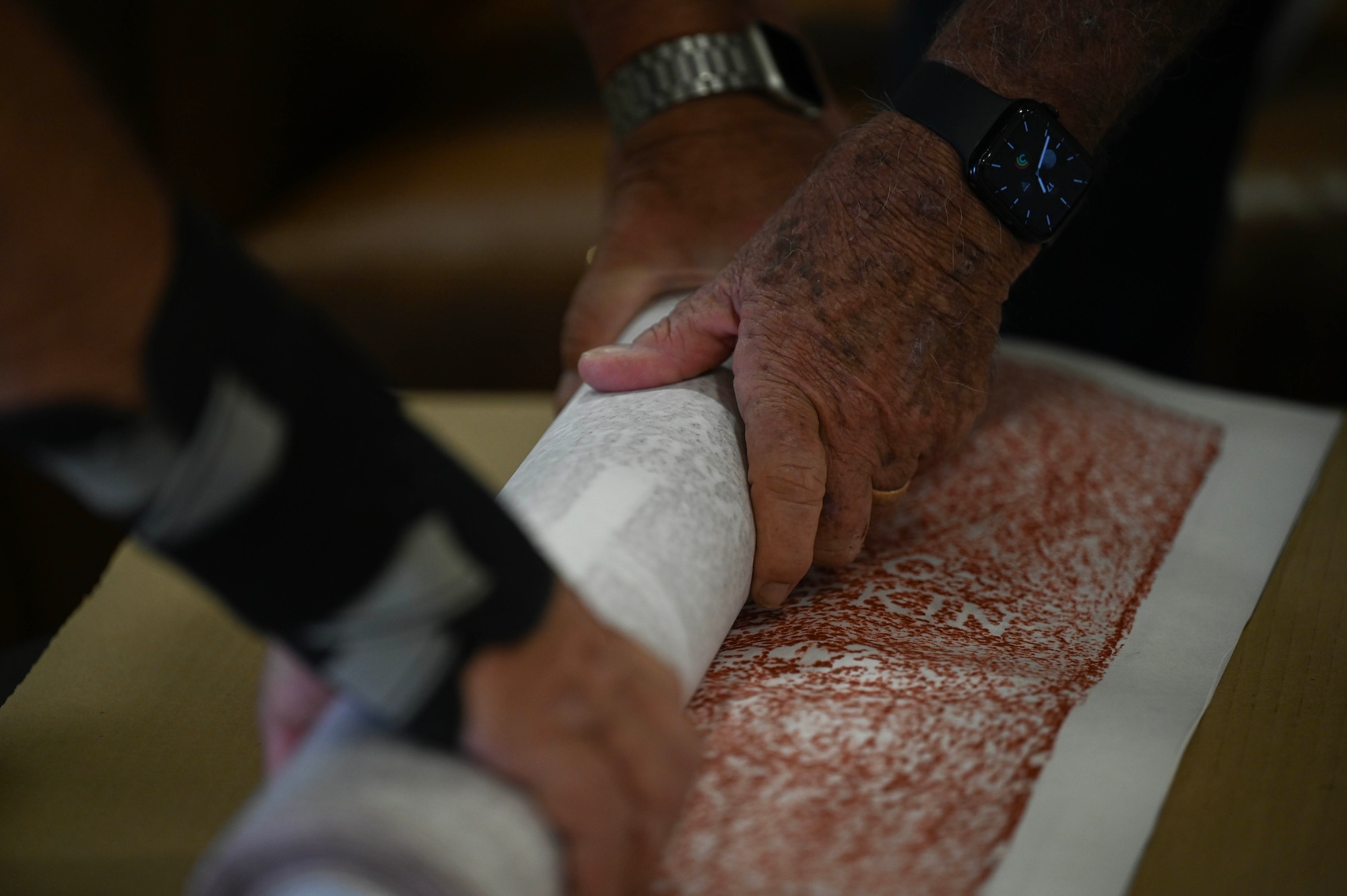 Todd Anderson and Brent Blackwell, Commemorative Air Force Birmingham Escadrille Wing unit members, package gravestone rubbings of 78 Royal Air Force Airmen buried at the Oakwood Cemetery Annex in Montgomery at Maxwell Air Force Base, Alabama, April 17, 2025.