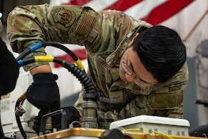 A maintenance Airman operates a testing kit.