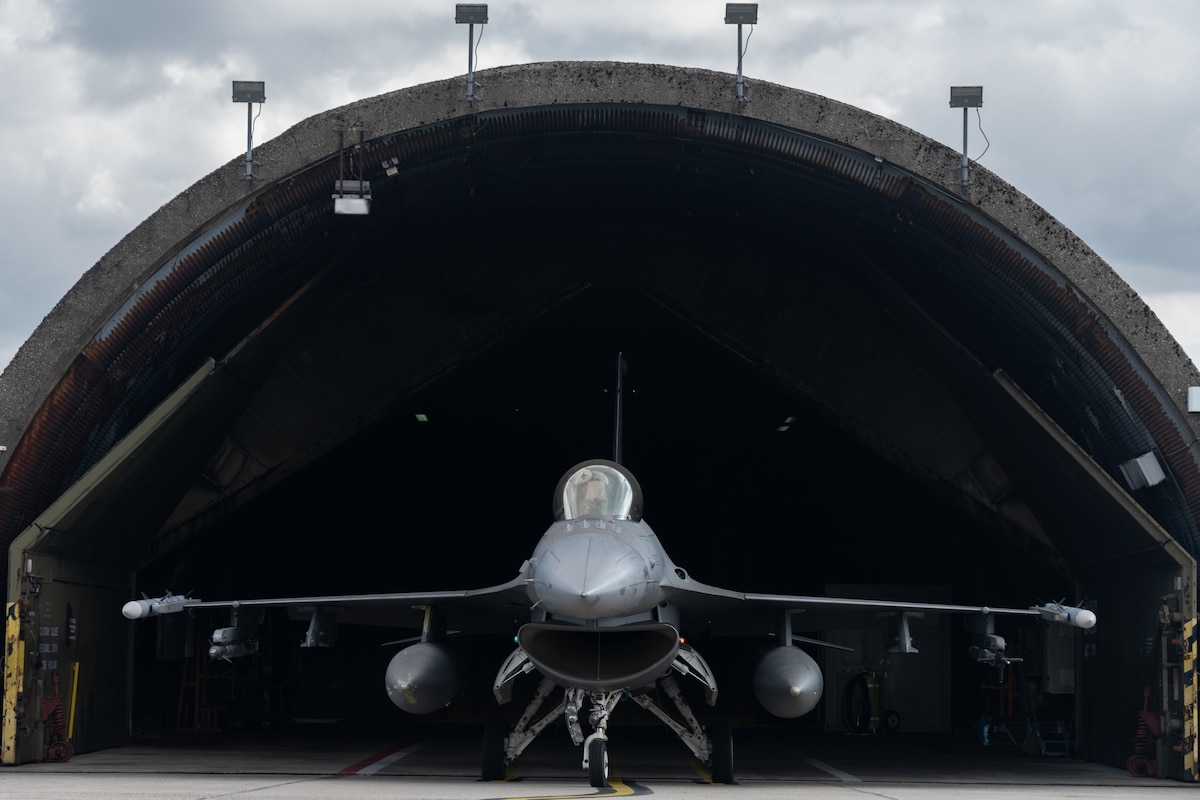 An F-16 in a shelter.