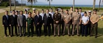 Members of the Defense POW/MIA Accounting Agency repatriation team, members of the Vietnamese Office for Seeking Missing Persons, and U.S. Ambassador Marc Knapper, pose for a photo during a repatriation ceremony in Vietnam, April 19, 2025.