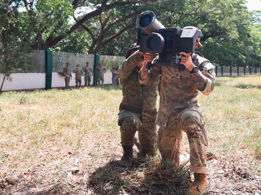 Philippine Army soldiers and U.S. Army Soldiers assigned to CDE Company, 1st Battalion, 21st Infantry Regiment, 2nd Infantry Brigade Combat Team, 25th Infantry Division, conduct hands-on training with the Javelin missile system during an Anti-Armor Subject Matter Expert Exchange (SMEE) at Fort Magsaysay, Philippines, March 25, 2025.