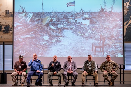 Emergency management professionals and military members answer questions about natural disaster response during the 2025 Oklahoma National Guard Domestic Operations Symposium, in Norman, Oklahoma, April 15, 2025.