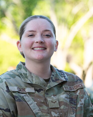 Female Airman in OCPs posing for a portrait shot.