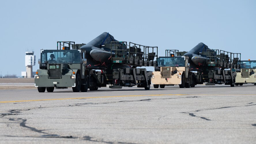 Airmen assigned to the 705th Munitions Squadron conduct convoy operations during Prairie Vigilance/Bayou Vigilance 25-1 at Minot Air Force Base, North Dakota, April 11, 2025. As routine training missions, Prairie Vigilance enhances the safety, security and reliability of the bomber leg of the U.S. nuclear triad. (U.S. Air Force photo by Senior Airman Kendra A. Ransum)