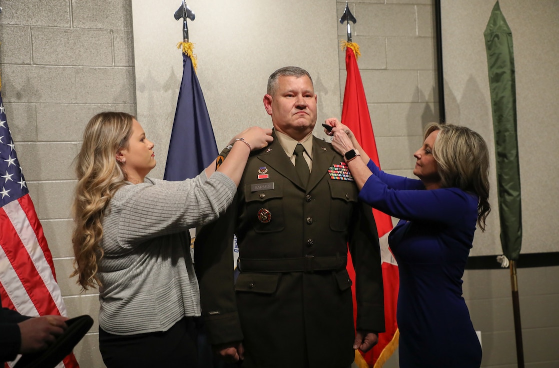 U.S. Army Col. Ronnie Barnes, flanked by his wife Sabrina (right), and daughter Makenzie, was promoted to brigadier general.