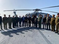 Vice Adm. J.T. Anderson, commander, U.S. Sixth Fleet, Ambassador Richard Norland, the U.S. special envoy for Libya, and Chargé d’Affaires Jeremy Berndt pose with key Libyan military and civilian officials during a key leadership engagement aboard the Blue Ridge-class command and control ship USS Mount Whitney (LCC 20) in Benghazi, Libya, April 21, 2025.