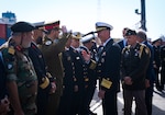 Vice Adm. J.T. Anderson, commander, U.S. 6th Fleet, greets key Libyan military and civilian officials before a key leadership engagement conference aboard the Blue Ridge-class command and control ship USS Mount Whitney (LCC 20) in Tripoli, Libya, April 20, 2025.
