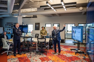 French Navy Admiral Pierre Vandier, North Atlantic Treaty Organization (NATO) Supreme Allied Commander Transformation (SACT), listens to a briefing at the Joint Commercial Operations cell (JCO) facility in Colorado Springs, Colo., April 7, 2025. During the visit, the JCO provided briefings on its various mission sets including protect and defend, tactical surveillance, Reconnaissance and Tracking (TacSRT), and Electromagnetic Spectrum Operations (EMSO), and demonstrations of operational toolsets. The JCO provides diverse, timely, non-classified Space Domain Awareness (SDA) and alerting services throughout the globe to U.S. Space Force, U.S. Space Command, and over 18 Allied and partner Nations, 24 hours a day, 5 days a week. (U.S. Space Force photo by Dalton Prejeant)